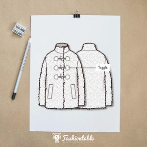 May include: A technical fashion sketch on white paper showing the front and back view of a fuzzy textured coat. The front view features three toggle closures with a line pointing to one labeled Toggle. A pencil and sharpener are visible nearby.