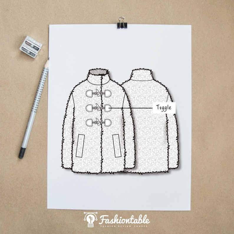 May include: A technical fashion sketch on white paper showing the front and back view of a fuzzy textured coat. The front view features three toggle closures with a line pointing to one labeled Toggle. A pencil and sharpener are visible nearby.