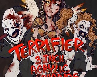 May include: Three 3-inch acrylic charms featuring characters from the horror film "Terrifier". The characters are a female with a bloody face and a golden crown, a clown with a bloody face, and a girl with a bloody face and a white dress.