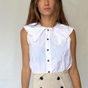Ganni white ruffle collar blouse with flared shoulders and brown buttons – sleeveless cotton feel top US M cottagecore preppy vibe