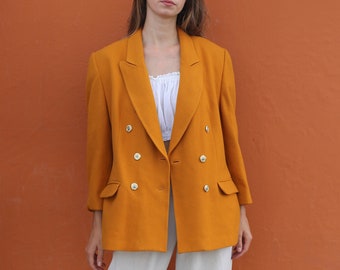 Oranje wollen vintage blazer, Emily in Paris kleurrijke statement-esthetiek, slimme, stoere Girl boss-kleding