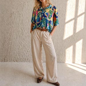 Canotta da donna vintage con stampa floreale tropicale, top floreale anni '60, maniche corte, abbigliamento estivo femminile e colorato