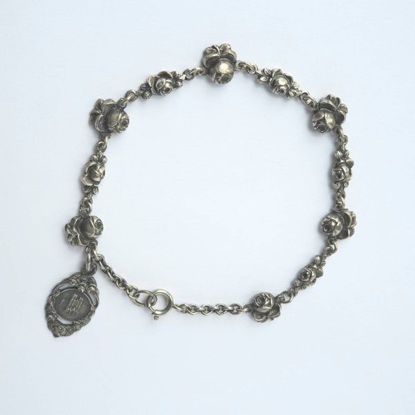 Bracelet ancien roses ton argent médaillon