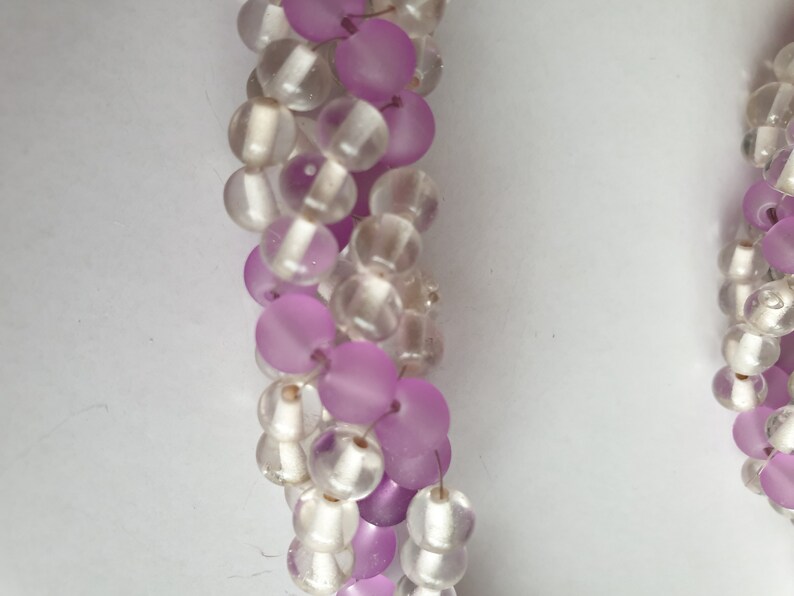 Purple and clear ornate curtain tie backs