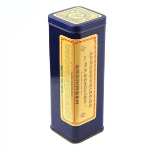 May include: A blue tin can with a gold label that reads "Aardappel Sago N.V. W.A. Scholten. Groningen." The label also includes the text "Inhoud 200 gram".