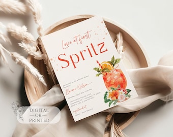 Puede incluir: Una invitación imprimible para una despedida de soltera con una ilustración de acuarela de un cóctel con una pajita roja y blanca, una rodaja de naranja y una ramita de hojas verdes. El texto "Love at first Spritz" está en letras rojas. La invitación incluye el texto "Por favor, únase a nosotros para una despedida de soltera en honor a Elena Nelson".