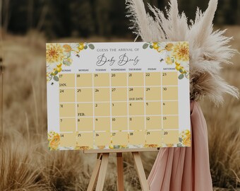 May include: A yellow and white floral baby shower game with a calendar to guess the arrival date of the baby. The calendar has the months January and February with the days of the week listed across the top. The text "Guess the arrival of Baby Benly" is at the top of the calendar.