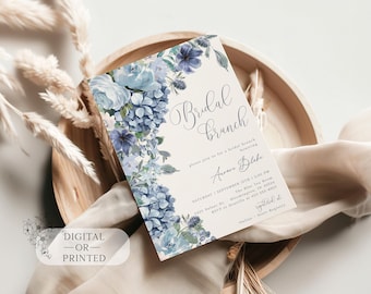 May include: A blue and white floral bridal brunch invitation with the text "Bridal Brunch" and "Please join me for a bridal brunch honoring Anna Blake". The invitation includes the date, time, and location of the event.