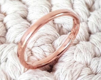 Massieve 14K roségouden bandring. Trouwring trouwring 2,2 mm. Klassieke eenvoudige effen band. Massief roségoud. Comfortabele pasvorm. Stapelen: