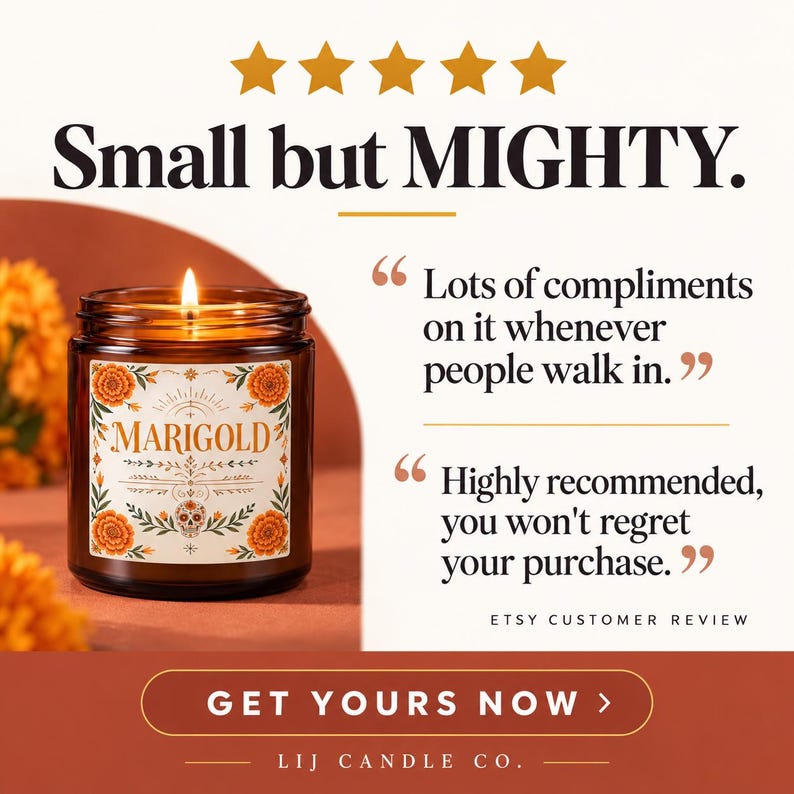 May include: A lit candle in an amber glass jar with a label featuring orange marigold flowers and a skull illustration. The text reads MARIGOLD, Small but MIGHTY, Lots of compliments on it whenever people walk in, Highly recommended, you won't regret your purchase, ETSY CUSTOMER REVIEW, GET YOURS NOW, and LIJ CANDLE CO.