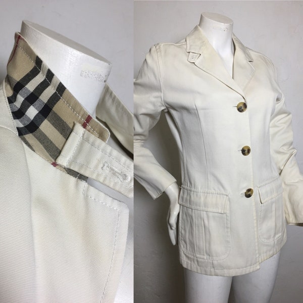 Veste en toile de coton couleur crème/blanc cassé, marque Burburry, esprit militaire/saharienne.