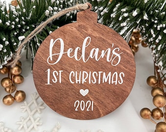 Baby's First Christmas Wooden Ornament | 3.5 inches | customizable name, year, and birth statistics on back