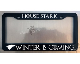 PROTECTED BY DRAGONS dragon License Plate Frame