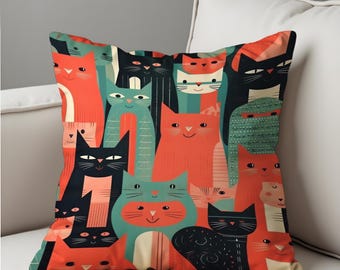 カラフルな猫のイラストが描かれたクッションカバー、モダンでレトロな