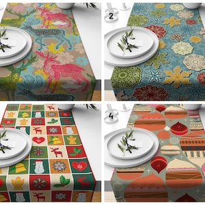 May include: Four different Christmas table runners with various designs. The first runner features a brown background with a repeating pattern of reindeer and snowflakes. The second runner has a blue background with a repeating pattern of snowflakes. The third runner has a green and red checkered background with a repeating pattern of Christmas ornaments. The fourth runner has a grey background with a repeating pattern of Christmas ornaments.