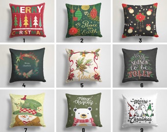 May include: Nine different Christmas pillow designs. The pillows feature various holiday themes, including a snowman, a polar bear, a Christmas tree, and a wreath. The pillows are all square and have a white background.