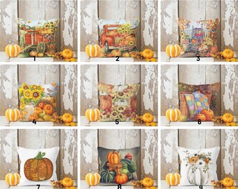 May include: Nine different throw pillow designs featuring fall harvest themes. The pillows feature images of pumpkins, gourds, sunflowers, and other fall foliage.
