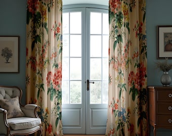 May include: A pair of cream-colored curtains with a floral print featuring red, pink, yellow, and blue flowers. The curtains are hung on a metal rod and are drawn back to reveal a set of French doors with a light blue paint finish.