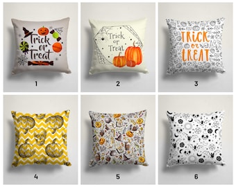 May include: Set of six Halloween-themed throw pillow covers. The covers feature various designs including pumpkins, skulls, bats, and the text "Trick or Treat".