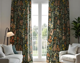 May include: A pair of green curtains with a woodland pattern featuring animals, flowers, and mushrooms. The curtains are hung on a window with a white frame.
