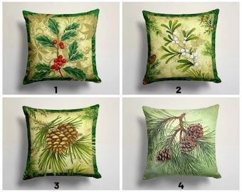 May include: Set of four square throw pillows with a green border and a cream background. Each pillow features a different botanical illustration: holly with red berries, white berries on a branch, pine cones on a branch, and pine cones on a branch with two pine cones.