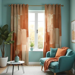 May include: Living room with orange and cream abstract patterned curtains. A teal armchair with an orange throw and pillow sits near the window. A small white table with a blue vase and plant is in front of the curtains.