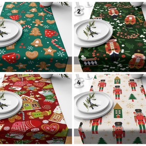 May include: Four different table runners with holiday themes. The first runner features gingerbread cookies and candy canes on a green background. The second runner features nutcrackers on a green background. The third runner features gingerbread houses and cookies on a red background. The fourth runner features nutcrackers and snowflakes on a cream background.