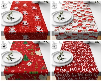 May include: Four different red table runners with festive Christmas designs. The first runner features a repeating pattern of Santa Claus figures. The second runner has a repeating pattern of Santa Claus faces. The third runner has a repeating pattern of Christmas trees and snowflakes. The fourth runner has a repeating pattern of the words "Ho Ho Ho" in white.