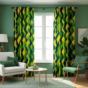 May include: Geometric patterned curtains in shades of green and yellow. The curtains feature a repeating diamond design. The room has a white window, a white chair, a green chair, and a small round table. The curtains are hanging in a room with green walls.