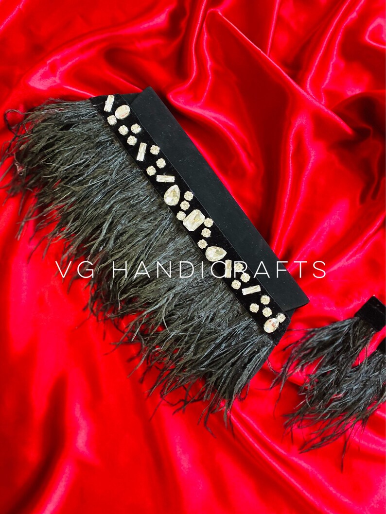Simply Divine Feather Clutch In Black