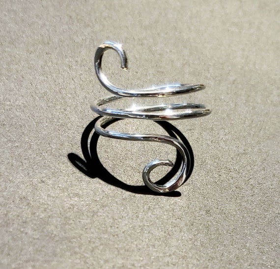Spiral thumb shop ring