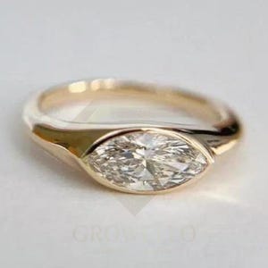 East West 1.5 CT Marquise Cut Moissanite Engagement Ring 14K Solid Gold Lab Grown Diamond Ring Bezel Set Ring  Solitaire Ring Promise Ring.