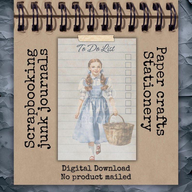 Wizard of Oz printable To Do List page shown clipped into spiral scrapbook journal. Vintage Dorothy illustration with basket on lined stationery background and checklist boxes. Scrapbooking junk journal insert printable for traveler’s notebooks, planner pages, and paper crafts. Digital download. No physical product mailed.