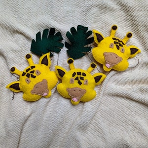 Handmade felt giraffe nursery garland decor | Nursery and kids room banner