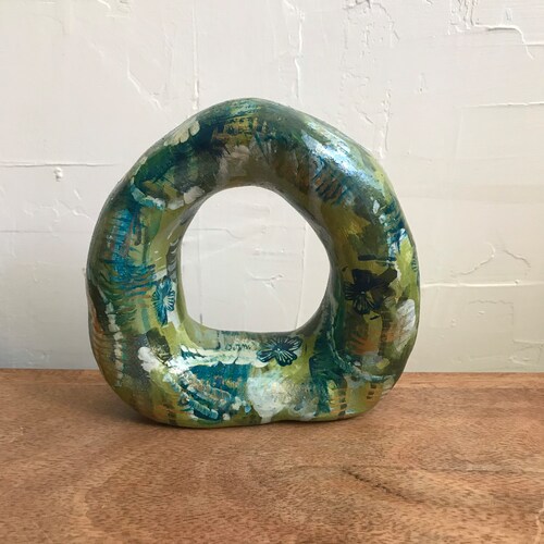 Rolling shops wheel, ceramic sculpture