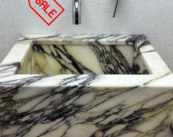 Calacatta Viola wall mounted sink
