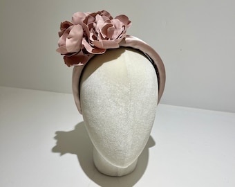 Dusky rose fascinator available in other colours. Flowers hand made in duchess satin.