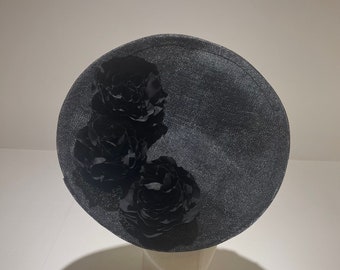 Black hat with black flowers