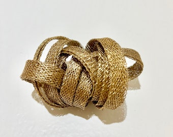Corsage broach; can be made to match any of the hats and fascinators on the Hatilly site.