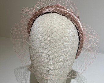 Veiled pink headband (Essie) Jewelled detail at the back. Available in other colours.