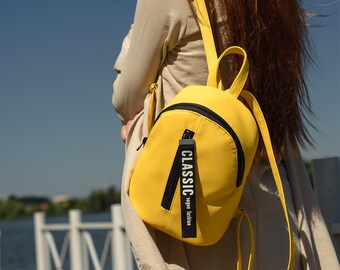 Mustard yellow online mini backpack