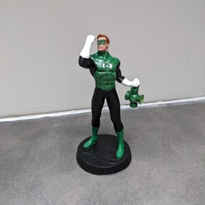Green Lantern miniatuur DC Comics editie in blister (karton + plastic) en het presentatieboekje van Green Lantern in het Frans