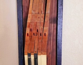 Piano Key Wall Hanger. See individual pricing.  Shipping not included. Shipping calculated at check out.