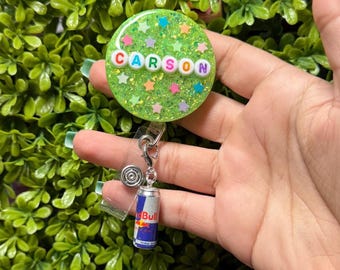 Charm para carrete de insignia de bebida energética