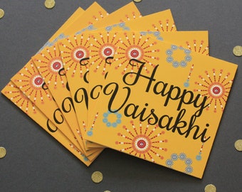 May include: A stack of yellow greeting cards with a colorful firework design and the text "Happy Vaisakhi".
