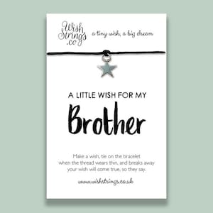 May include: A black string bracelet with a silver star charm. The card reads "A little wish for my Brother. Make a wish, tie on the bracelet when the thread wears thin, and breaks away your wish will come true, so they say. www.wishstrings.co.uk"
