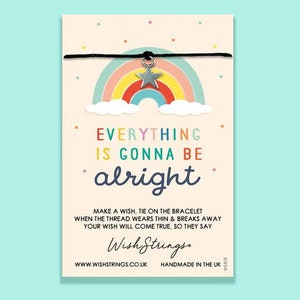 May include: A rainbow-colored bracelet with a silver star charm. The bracelet has a black string and the card reads "Everything is gonna be alright." Make a wish, tie on the bracelet. When the thread wears thin & breaks away your wish will come true, so they say. Wish Strings. www.wishstrings.co.uk Handmade in the UK.
