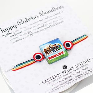 Robot Colorful Characters Friendship Thread/Rakhri / Presentado en un tablero de respaldo de lujo con palabras especiales