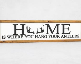 Placa com chifres: Decoração rústica para cabana de caça