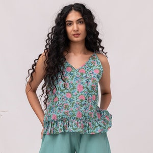 Linen Peplum Top: Sleeveless Ruffle Waist Blouse
